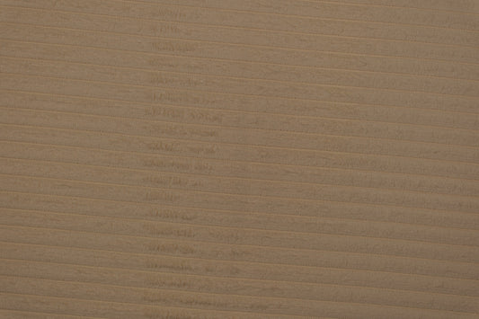 Heller Cord Möbelstoff in Creme – weicher Polsterstoff mit Rippenstruktur Detailaufnahme der Stoffstruktur