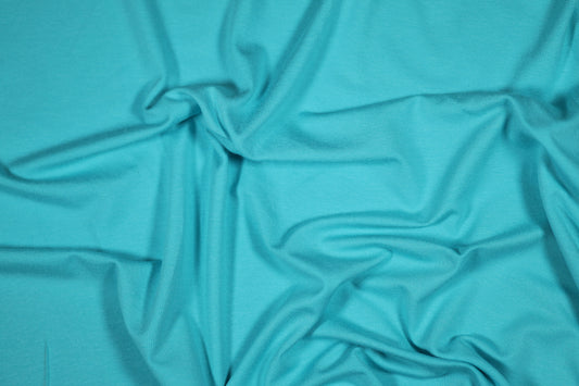 Jersey Stoff aus Viskose in Türkis – perfekt für Shirts und Kleider