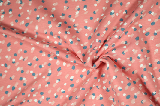 Tupfenmuster für Kinderbekleidung – weich & lebendig.