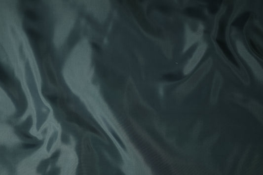 Futterstoff dunkelgrün glänzend – hochwertige Verarbeitung