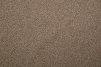 Möbelstoff Bouclé in Sandbeige als Polsterstoff für Sofa und Sessel Detailaufnahme der Stoffstruktur