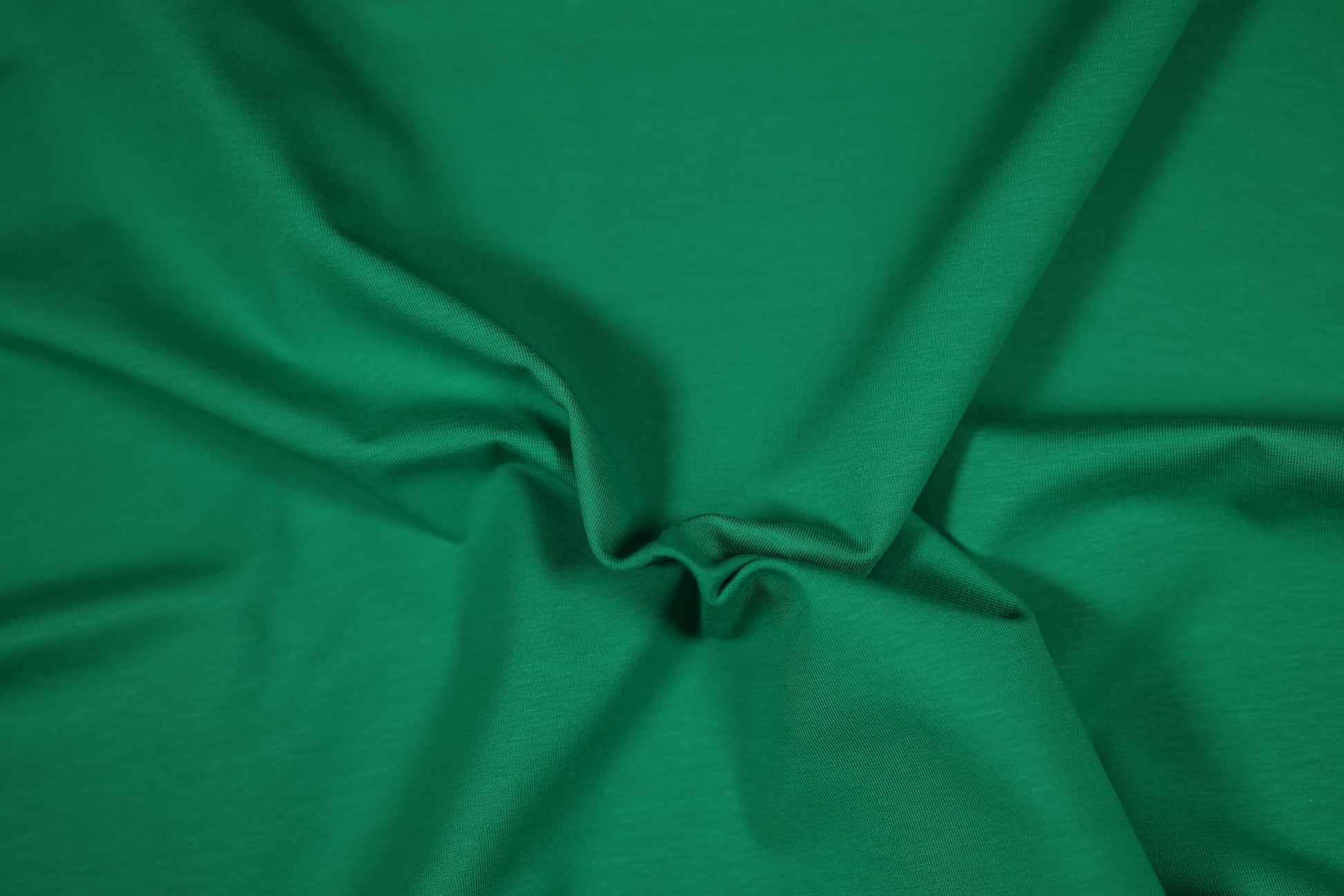 Kräftiger Baumwolljersey in Grasgrün – ideal für Sportmode