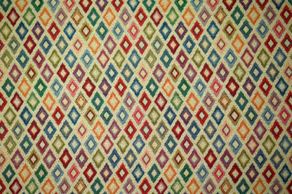 Bunter Möbelstoff mit kleinen Rauten in Multicolor – modern & markant