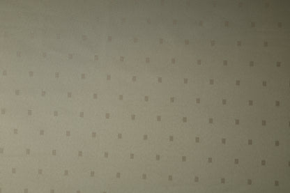 Tischdeckenstoff in Beige mit kleinen eingewebten Punkten