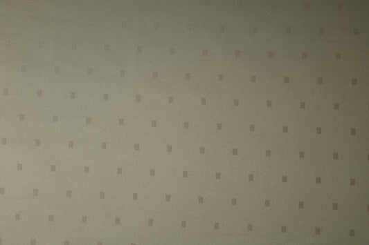 Tischdeckenstoff in Beige mit kleinen eingewebten Punkten