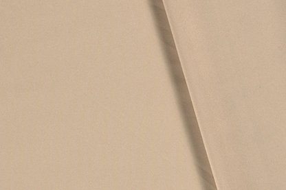 Beiger Uni Stoff aus Polyester mit matter Oberfläche Stoffeya